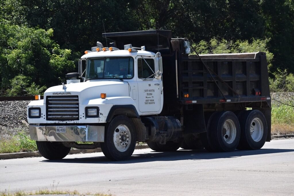 dump truck, truck, road, dumper, delivery, construction equipment, transport, trucking, industry, hard hat area, contractor, white car, heavy load, payload, hard work, travel, tools, escavator, dump truck, dump truck, dump truck, dump truck, dump truck